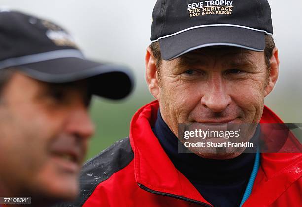 Nick Faldo, Captain of The Great Britain and Ireland Team with Seve Ballesteros, Captain of The European Team during the third day morning greensomes...