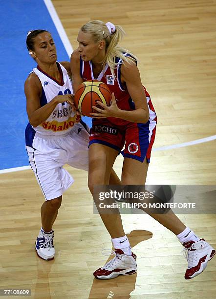 Serbia's Milica Dabovic vies with Russia's Maria Stepanova during their Group F qualifying round of the Women European Basketball Championships at...
