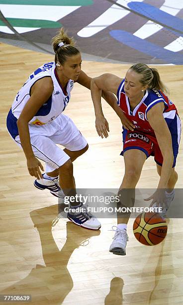 Serbia's Milica Dabovic vies with Russia's Oxana Rakhmatulina during their Group F qualifying round of the Women European Basketball Championships at...