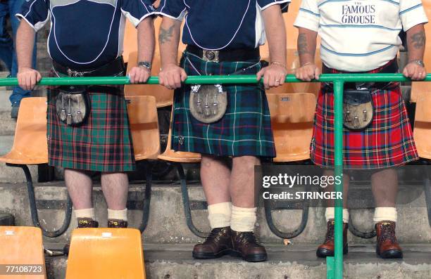 Scotland rugby union team fans cheer as they prepare to watch their team challenge Italy during the rugby union group C World Cup match Scotland vs....