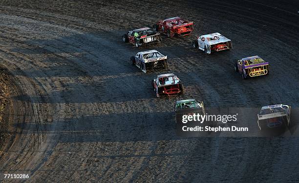 Cars line up for the start of a race during the Lone Star Nationals Dirt Track races at Texas Motor Speedway September 29, 2007 in Fort Worth, Texas.