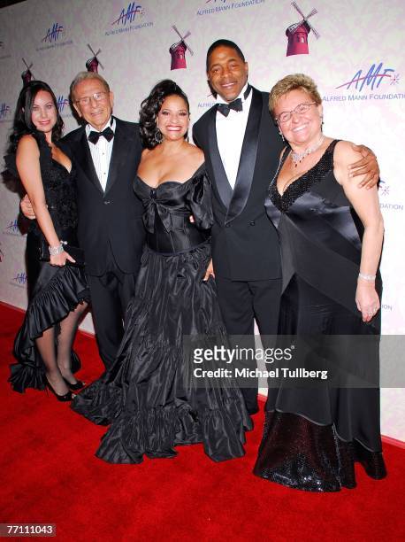 Cassandra Mann, philantropist Alfred Mann, actress/choreographer Debbie Allen and husband Norm Nixon, and Claude Mann pose on the red carpet at the...