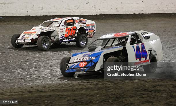 Troy Taylor races Scotty Brown during the IMCA Modified Championship during the Lone Star Nationals Dirt Track races at Texas Motor Speedway...