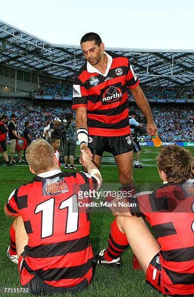 David Peachey of the Bears shakes hands with team-mate Shannan McPherson after the 2007 Premier League Grand Final between the Parramatta Eels and...