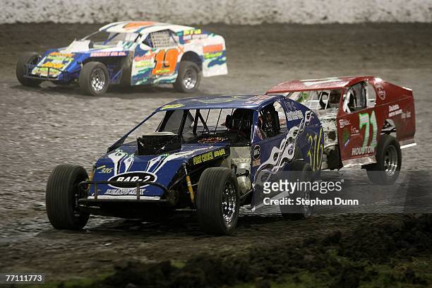 Cars race on September 29, 2007 during the Lone Star Nationals Dirt Track races at Texas Motor Speedway in Fort Worth, Texas.