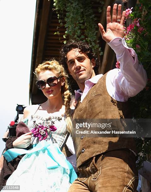 Bayern Munich?s player Luca Toni arrives with his wife Marta Cecchetto at the Kaefer?s party tent for a day at the Oktoberfest on September 30, 2007...