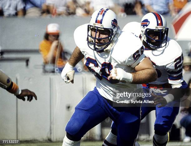 Buffalo Bills Hall of Fame guard Joe DeLamielleure leads runnning back Roland Hooks in a 31-10 loss to the Tampa Bay Buccaneers on November 19, 1978...