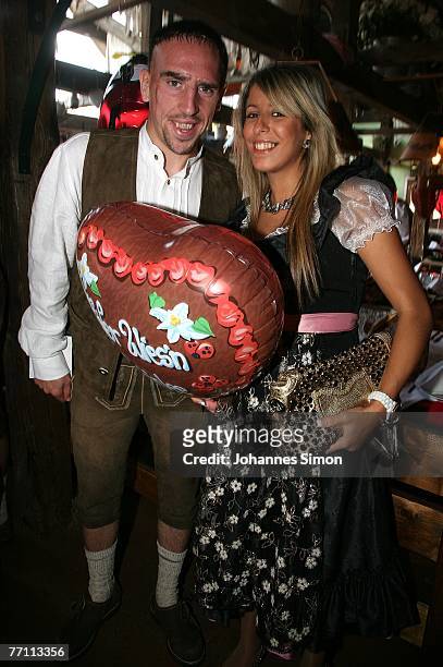 Frank Ribery of Bayern Munich and his wife Wahiba arrive at the Kaefers party tent for a day at the Oktoberfest on September 30, 2007 in Munich,...