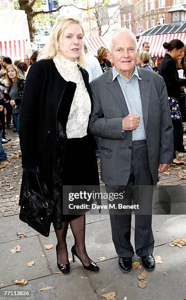 Sir Ian Holm and guest arrive at the UK film premiere of 'Ratatouille', at the Odeon Leicester Square on September 30, 2007 in London, England.