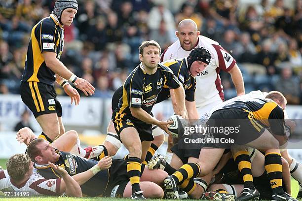 Simon Amor of London Wasps looks to pass during the Guinness Premiership match between London Wasps and Leicester Tigers at Adams Park on September...