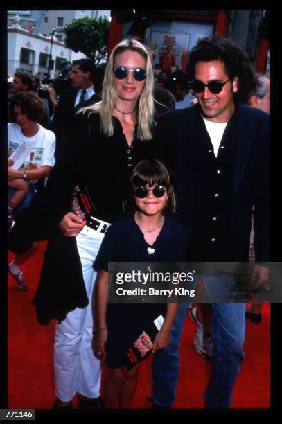 Actress Kelly Lynch stands with her daughter and M. Glazer at the special screening of "Dennis the Menace" June 19, 1993 in Hollywood, CA. The film...