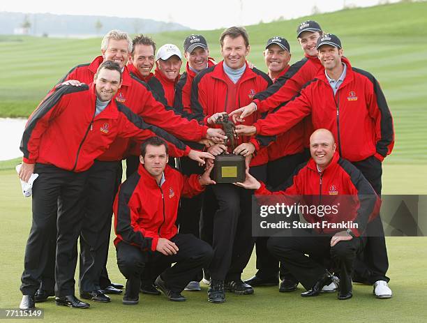 The Great Britian and Ireland Team with the trophy after winning the final day singles at the Seve Trophy 2007 held at The Heritage Golf and Spa...
