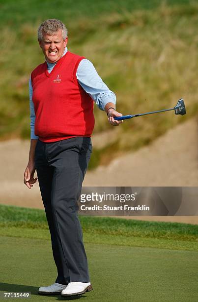 Colin Montgomerie of The Great Britain and Ireland Team reacts to his putt on the eighth hole during the final day singles at the Seve Trophy 2007...