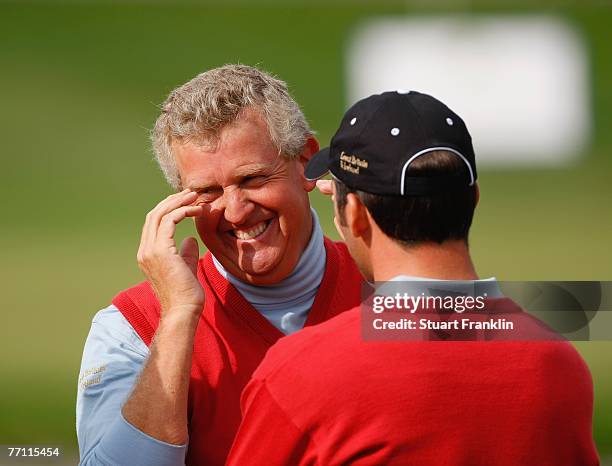 Colin Montgomerie and Paul Casey of The Great Britain and Ireland Team celebrate after the final day singles at the Seve Trophy 2007 held at The...