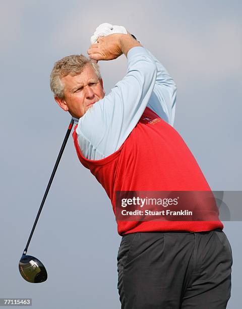 Colin Montgomerie of The Great Britain and Ireland Team plays his tee shot on the nineth hole during the final day singles at the Seve Trophy 2007...