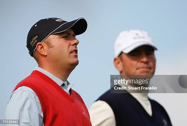 Graeme Storm of The Great Britain and Ireland Team with Thomas Bjorn of The European Team whom he beat six and five during the final day singles at...