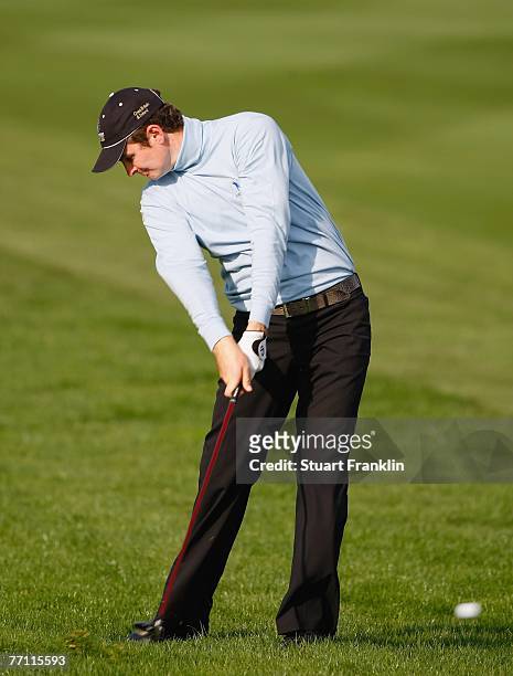 Justin Rose of The Great Britain and Ireland Team plays his approach shot on the 14th hole during the final day singles at the Seve Trophy 2007 held...