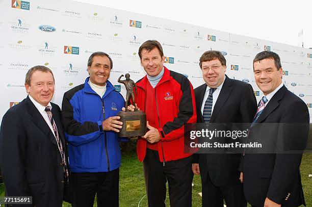 Tommy Keane, Owner of The Heritage Golf and Spa Resort,Seve Ballesteros, Captain of The European Team presents the trophy to Captain Nick Faldo of...