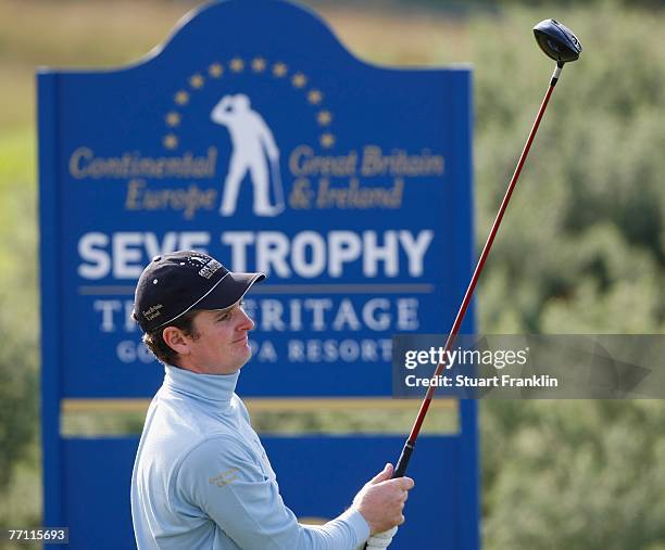 Justin Rose of The Great Britain and Ireland Team plays his tee shot on the 13th hole during the final day singles at the Seve Trophy 2007 held at...