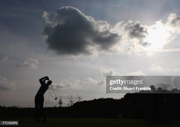 Justin Rose of The Great Britain and Ireland Team plays his tee shot on the 14th hole during the final day singles at the Seve Trophy 2007 held at...