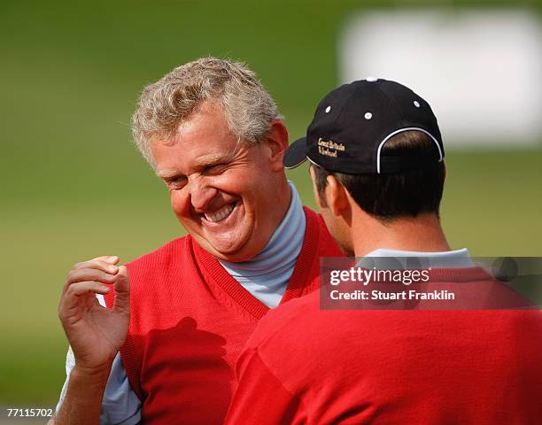 Colin Montgomerie and Paul Casey of The Great Britain and Ireland Team celebrate after the final day singles at the Seve Trophy 2007 held at The...