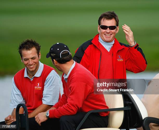Nick Dougherty, Paul Casey and Captain Nick Faldo of The Great Britain and Ireland Team during the final day singles at the Seve Trophy 2007 held at...