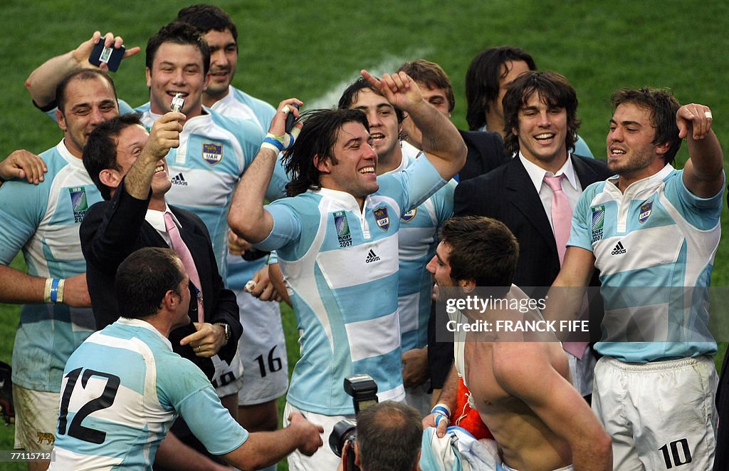 Argentinian players celebrate at the end