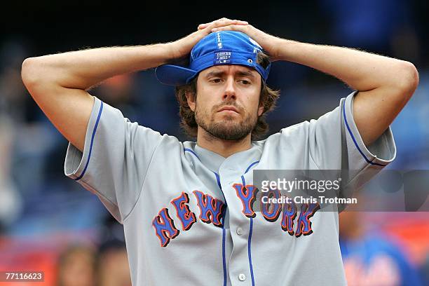 Disconcerted New York Mets fan reacts following the Mets' loss to the Florida Marlins during the MLB game at Shea Stadium September 30, 2007 in the...