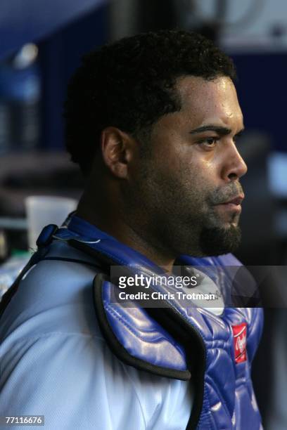 Catcher Ramon Castro of the New York Mets looks on in the dugout during the game against the Florida Marlins at Shea Stadium September 30, 2007 in...