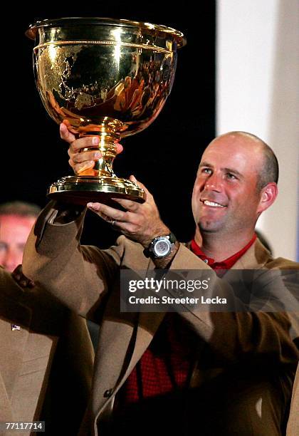 Stewart Cink of the U.S. Team holds the trophy at The Presidents Cup at The Royal Montreal Golf Club on September 30, 2007 in Montreal, Quebec,...