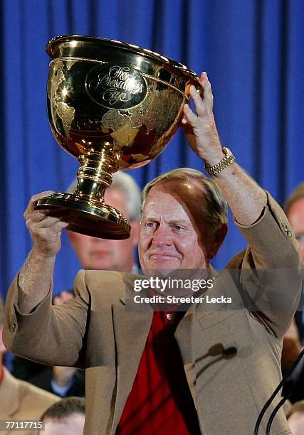 Team Captain Jack Nicklaus of the U.S. Team is presented with the trophy after defeating the International Team in The Presidents Cup at The Royal...