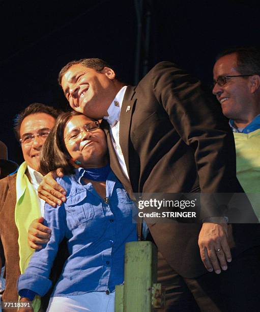 Ecuadorean President Rafael Correa hugs candidate for Acuerdo Pais party Monica Chuji after getting a majority of members for the new Constituent...