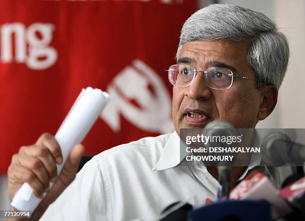 General Secretary of the Communist Party of India Marxist Prakash Karat gestures as he addresses the media after a three-day party politburo and...