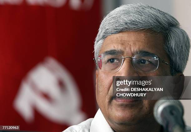 General Secretary of the Communist Party of India Marxist Prakash Karat gestures as he addresses the media after a three-day party politburo and...