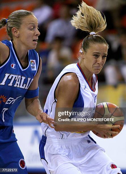 Serbia's Milica Dabovic vies with Italy's Francesca ZaraIrina during their Group F qualifying round of the Women European Basketball Championships at...