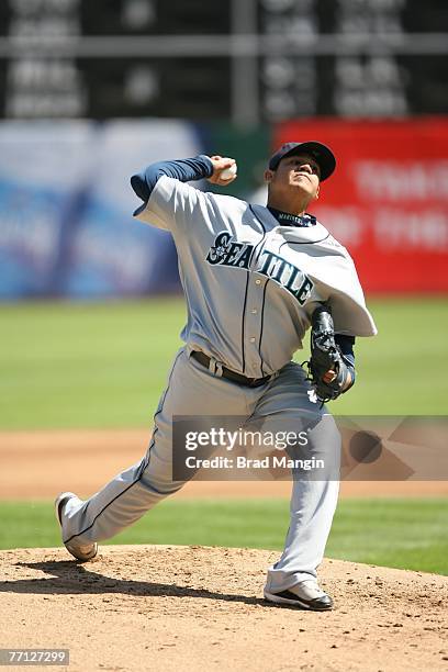 Felix Hernandez of the Seattle Mariners pitches during the game against the Oakland Athletics at the McAfee Coliseum in Oakland, California on...
