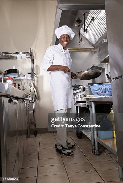 african american male chef in kitchen - chef full length stock pictures, royalty-free photos & images