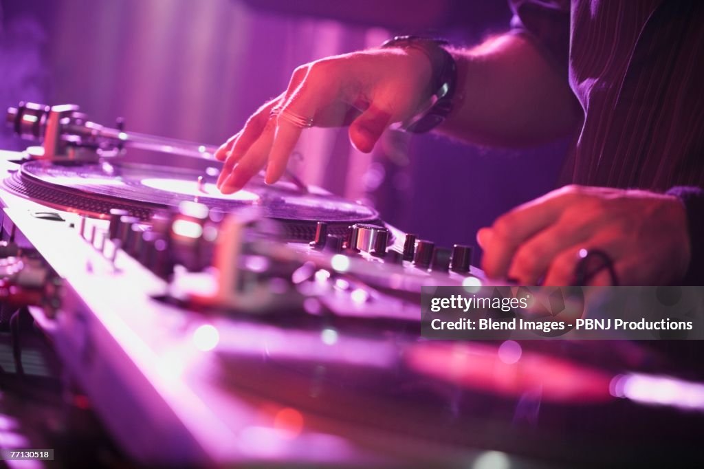 Close up of Hispanic nightclub dj