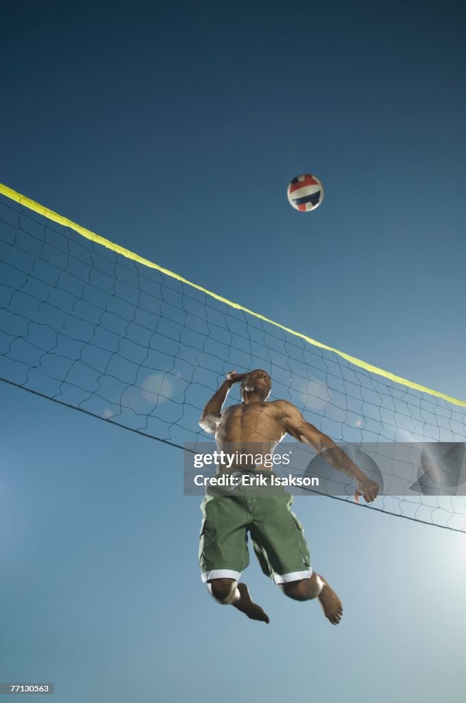 African American man playing volleyball