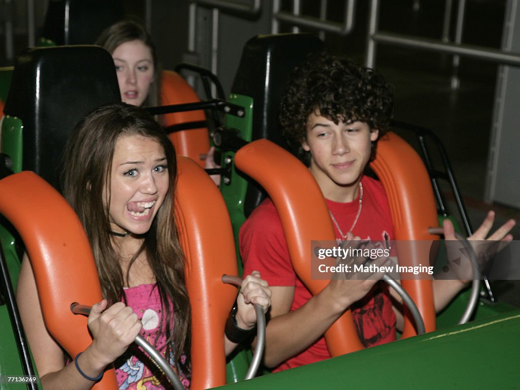 Miley Cyrus and The Honas Brothers Visit Six Flags Magic Mountain