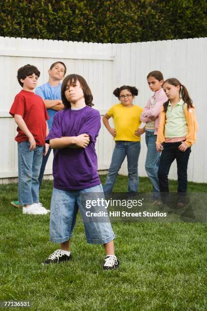 mixed race children posing in yard - child aggression stock pictures, royalty-free photos & images