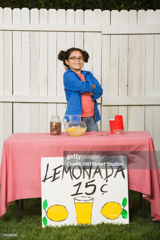 Mixed Race girl selling lemonade