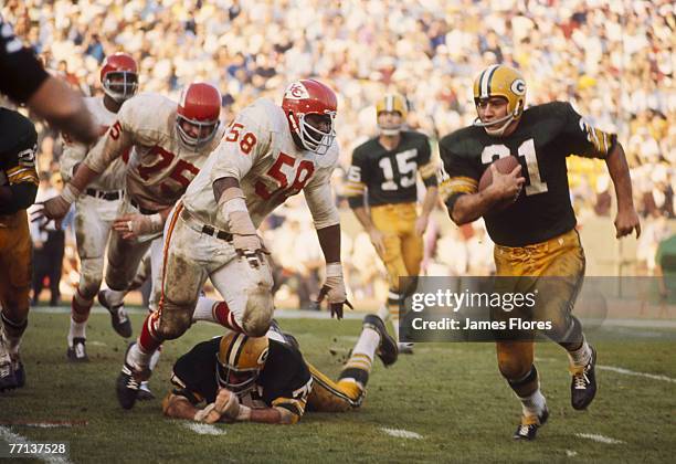 Green Bay Packers Hall of Fame fullback Jim Taylor carries the ball during Super Bowl I, a 35-10 victory over the Kansas City Chiefs on January 15 at...