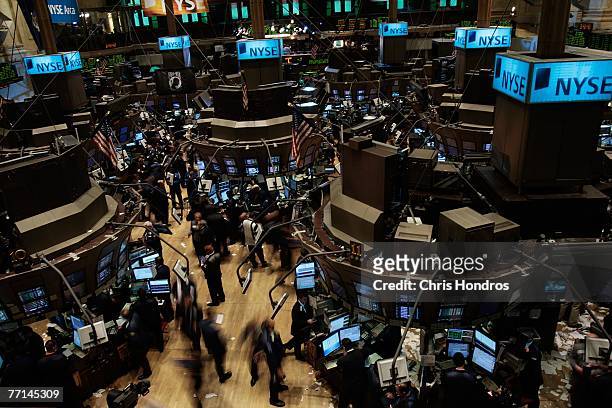 Traders move on the floor of the New York Stock Exchange near the closing bell October 1, 2007 in New York City. Today the Dow Jones industrial...