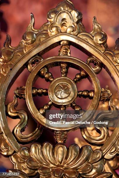 chua vinh nghiem buddhist pagoda. dharma wheel. dharmachakra, the buddhist eight-fold path illustrated in a wheel. ho chi minh city. vietnam.  - dharmachakra stock pictures, royalty-free photos & images