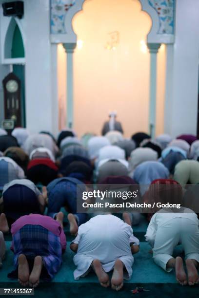 masjid al rahim mosque. the friday prayer (salat). muslim men praying. ho chi minh city. vietnam. - back friday stock pictures, royalty-free photos & images