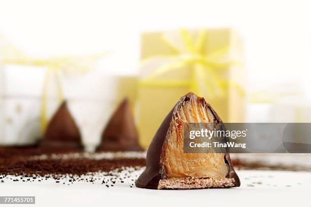 gift boxes and caramel chocolates - candy wang stock pictures, royalty-free photos & images