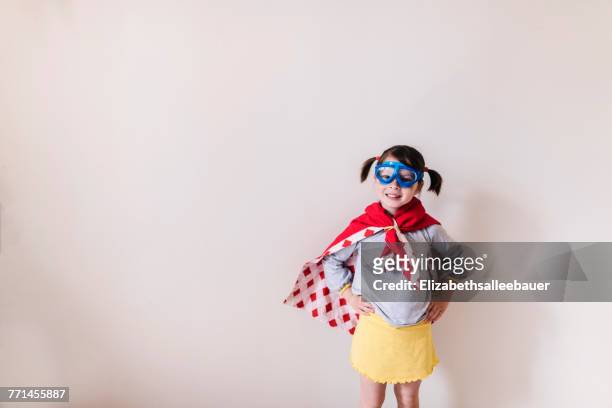 portrait of a girl dressed as a superhero - förklädnad bildbanksfoton och bilder