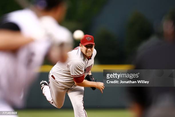 Brandon Webb of the Arizona Diamondbacks pitches during the game against the Colorado Rockies at Coors Field in Denver, Colorado on September 28,...