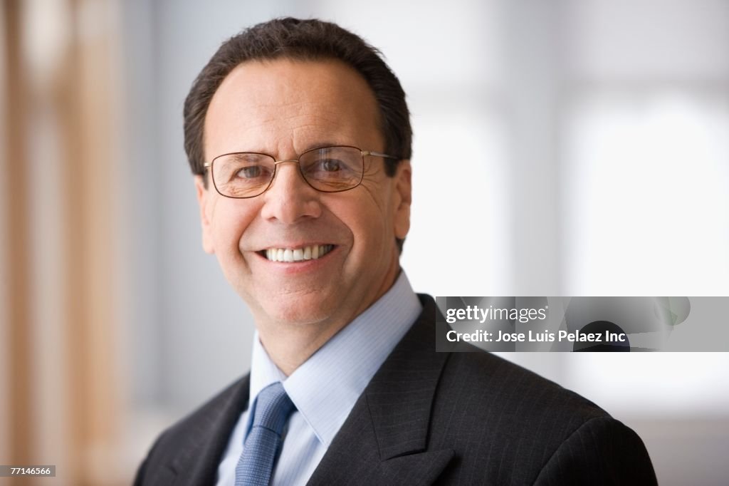 Portrait of middle-aged Hispanic businessman